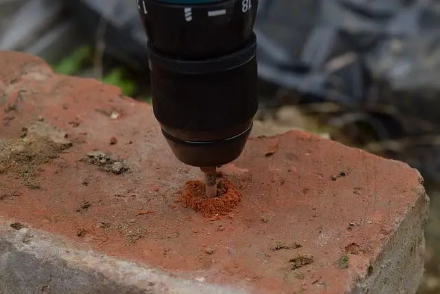 How to Drill into a Brick Without a Hammer Drill